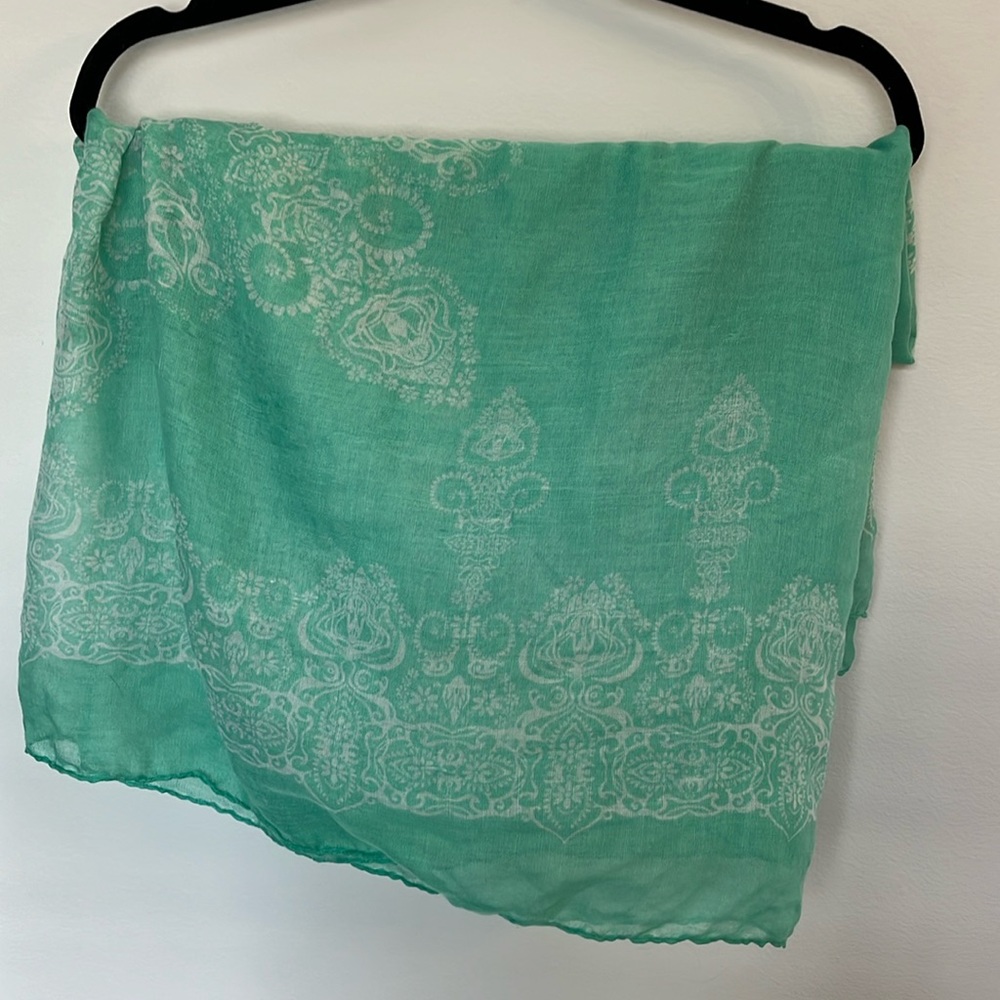 Teal and white patterned scarf